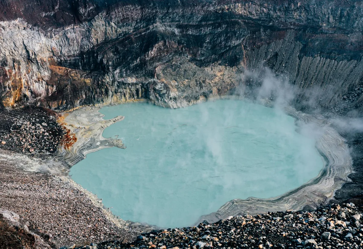 Kelimutu volcano three colored crater lakes viewed from the rim, Flores Indonesia