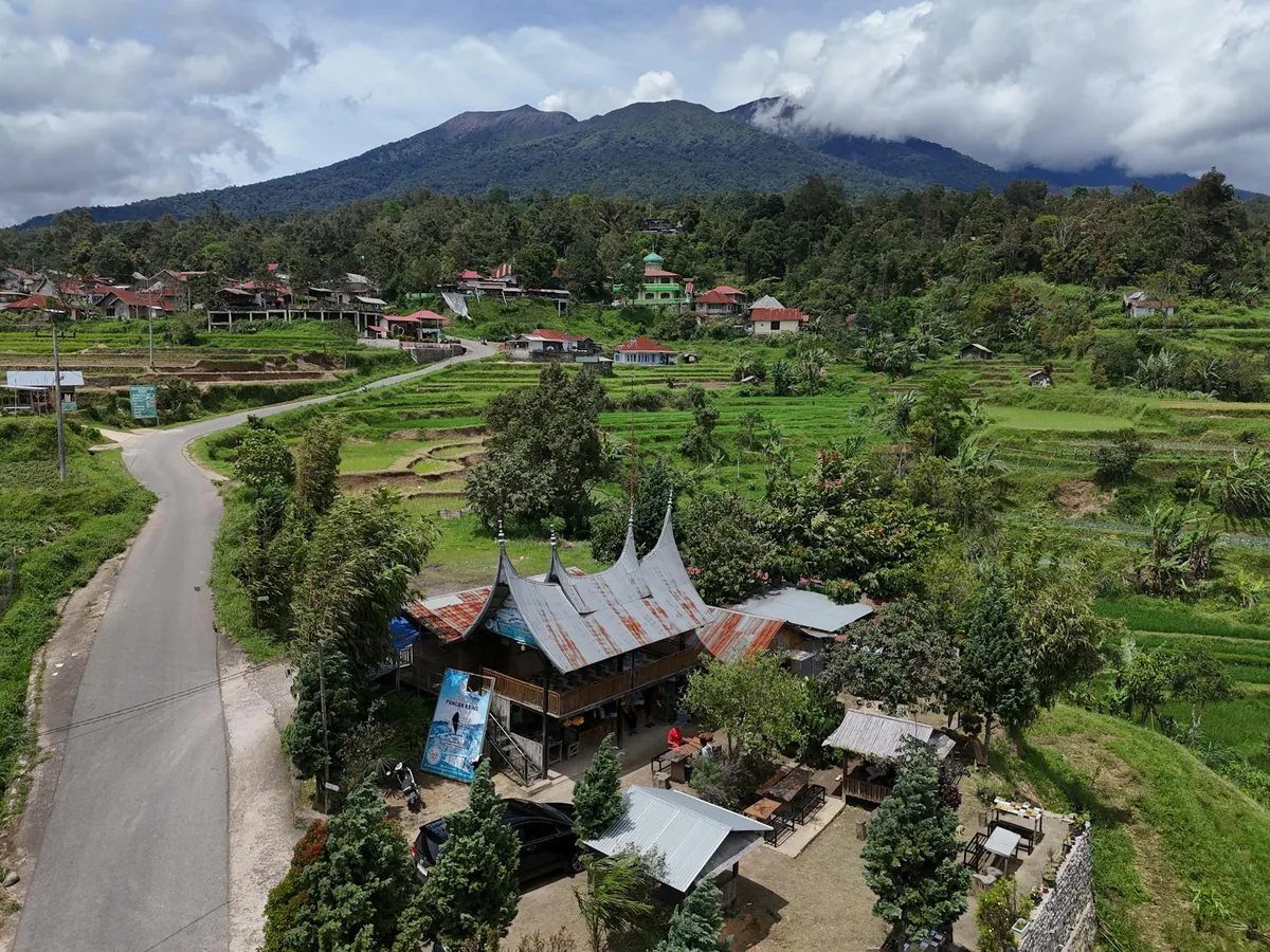 Trans-Flores Highway winding through volcanic highlands, Flores Island Indonesia
